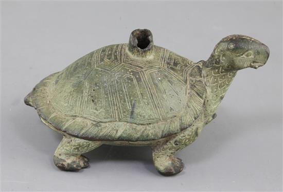 A Chinese archaic bronze tortoise lamp base, probably Six Dynasties, 4th-5th century A.D. 15.5cm long, 9cm high, restoration to head